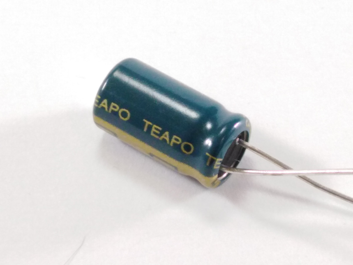 Condensateur chimique 100uF 63V DSC107M063S1ACG15K (image 2/3)